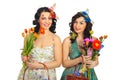 Spring women with fresh flowers Royalty Free Stock Photo