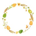 Spring wreath with Easter eggs, pussy willow, feathers and flowers, rustic style. Eco farming.