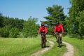 Spring - Young couple cycling in a nature Royalty Free Stock Photo