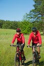 Spring - Young couple cycling in the nature Royalty Free Stock Photo