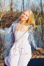 Spring young woman near river Royalty Free Stock Photo