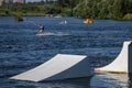 springboard on the surface of the reservoir for wakeboarding Royalty Free Stock Photo