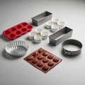 Springform pan a fluted tart pan a red silicone muffin tray a brown Royalty Free Stock Photo