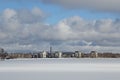 A springlike and sunny day on a snow covered lake.