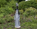 Springstone sculpture titled Girls Night by Stephen Murenza in the Fort Worth Botanic Garden.