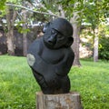 Springstone sculpture titled Listening Monkey by Godfrey Kututwa in the Fort Worth Botanic Garden.
