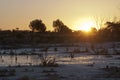 View of sunset across a salt lake Royalty Free Stock Photo