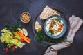 Springtime chickpea hummus bowl with veggies