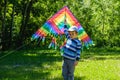 Springtime concept idea, spring background environment, character.Kite in summer boy playing on field, park day, activity