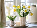 Springtime home decor, spring interior decorations with flowers and burning candles, bright white apartment in daylight