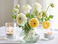 Springtime home decor, spring interior decorations with flowers and burning candles, bright white apartment in daylight