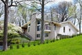 Springtime Stucco House on Hill Royalty Free Stock Photo