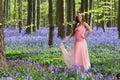 Springtime woman in bluebells forest Royalty Free Stock Photo