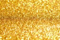 Sprinkle glitter gold dust abstract background Royalty Free Stock Photo