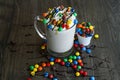 sprinkle ice cream shake with colorful candy served in glass isolated on table side view of healthy drink Royalty Free Stock Photo