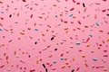 Sprinkle pattern on a pink canvas, perfect for diverse design