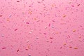 Sprinkle pattern on a pink canvas, perfect for diverse design