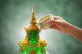 Sprinkle water on the Emerald Buddha Royalty Free Stock Photo