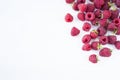 Sprinkled raspberries on white background. Ripe raspberries with copy space for text. Raspberry on a white background. Top view. V Royalty Free Stock Photo