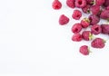 Sprinkled raspberries on white background. Ripe raspberries with copy space for text. Raspberry on a white background. Top view. V Royalty Free Stock Photo