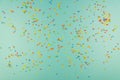 Sprinkles background, sugar sprinkle confetti, decoration for cake and bakery. Top view, flat lay. pastel colors