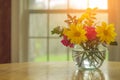 Sprint flowers assorted in vase with spring weather outside and