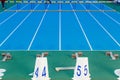 Sprint start line with blocks on track and field Royalty Free Stock Photo