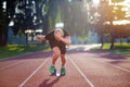 Sprinter leaving starting blocks on the running track. Explosive start. Royalty Free Stock Photo