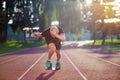 Sprinter leaving starting blocks on the running track. Explosive start. Royalty Free Stock Photo