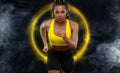 Sprinter run. Strong athletic woman running on black background wearing in the sportswear. Fitness and sport motivation Royalty Free Stock Photo