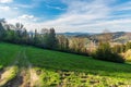 Sprintime evening above Cadca town in Slovakia with hills covered by mix of meadows and forest Royalty Free Stock Photo