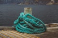 Spriral natical rope at a wooden pier Royalty Free Stock Photo