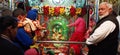 Spritual Singha devi tample front view with people and pandit