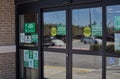 Sprouts grocery retail store entrances signs on doors