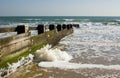 Spume on groyne, Dorset