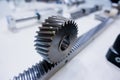 Spur gear rack and pinion. Toothed gear on a toothed shaft Royalty Free Stock Photo