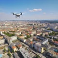 Spy drone weapon flying under city. Military technology, buildings, civilian town, blue summer sky