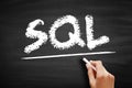 SQL Structured Query Language - standardized language for defining and manipulating data in a relational database, acronym text on Royalty Free Stock Photo