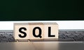 SQL text Structured Query Language on wooden cubes, language concept