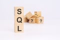 SQL text Structured Query Language on wooden cubes, language concept