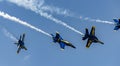 Squadron of jets soaring through the sky, creating white contrails in their wake Royalty Free Stock Photo