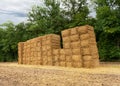 Square bale of hay in a field during the autumn harvest.