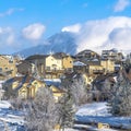 Square Beautiful houses on a snowy mountainside residential community in winter Royalty Free Stock Photo