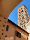 Square bell tower of the church of San Silvestro in Capite to Rome in Italy.
