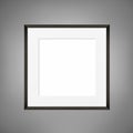 Square blank picture frame on grey wall. Vector template