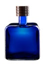 Square blue glass bottle full of tequila. Royalty Free Stock Photo