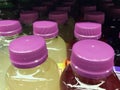 Square bottles of various fruit drinks Royalty Free Stock Photo