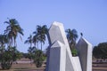 Square in BrasÃÂ­lia with a small lake, blue sky and many concrete strutute