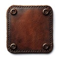 Square brown leather patch with rivets isolated on white background Royalty Free Stock Photo