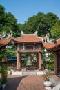 Square building holding a big bell on side of Imperial Academy in Temple of Literature Van Mieu, the first national university Royalty Free Stock Photo